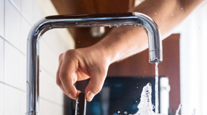 water tap being turned on